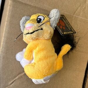 Yellow and Gray Stuffed Animal Toy